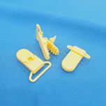 PINZA CHUPETERO PLASTICO AMARILLO